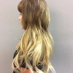 Side view of long light ombre hair extensions.  Hair extensions by Noel Strang.