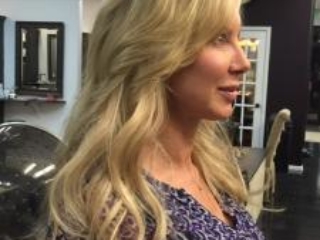 Side view with hair extensions - gorgeous, long, full-bodied hair. Hair extensions by Noel Strang.