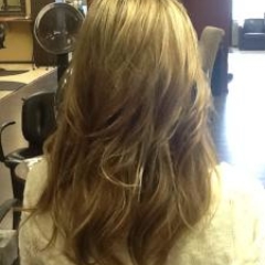 With hair extensions - long, thick, beautiful hair. Hair extensions by Noel Strang.