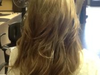 With hair extensions - long, thick, beautiful hair. Hair extensions by Noel Strang.