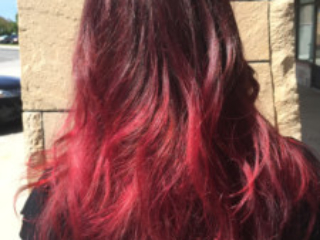 Creative color red ombre on long, gorgeous hair. Hair by Noel Strang