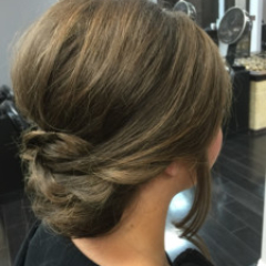 Updo for a formal occasion - side/back view. Hair by Noel Strang